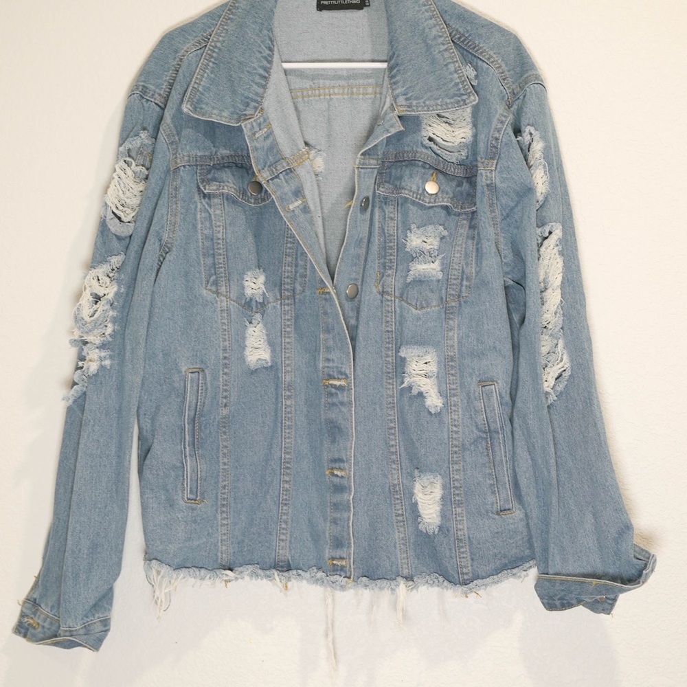 Distressed denim jacket
